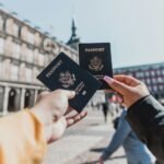 person holding passports